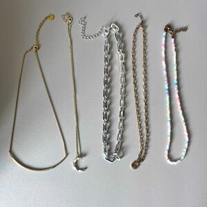 Beautiful fashion necklace set - three gold tone, one silver tone and one beaded